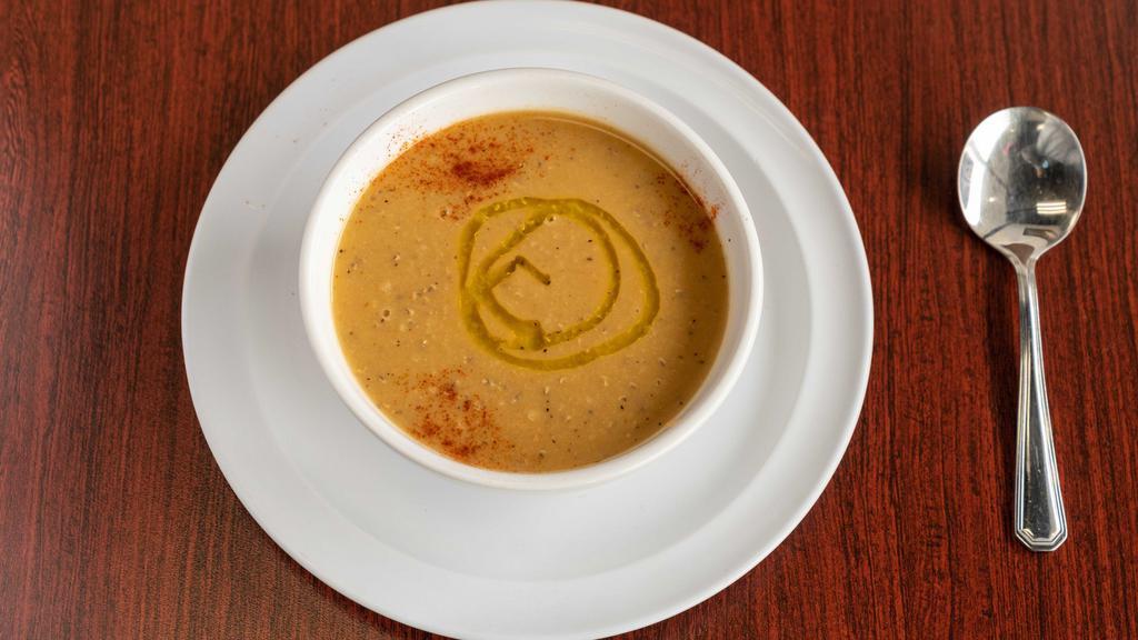Lentil Soup · Red lentils mixed with onions and mediterranean spices.