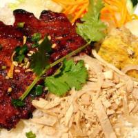 Tri-Color Rice · Grilled pork chop, shredded pork, meat loaf served with steamed rice and nuoc mam.