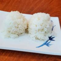 Steamed Rice · Two extra scoops of warm steamed white rice.