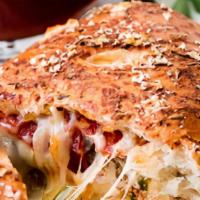 Chicken Special Calzone (Large) · Chicken, mushroom, onion and  pepper.