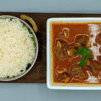 Goat Curry · This very notable Indian food flavored with coriander powder, cumin, black pepper, turmeric ...
