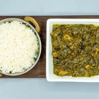 Chicken Saag · This dish combines the savory sourness of Greens with a tomato-onion gravy, chicken and spic...