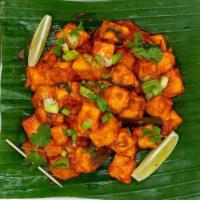 Paneer 65 · A unique South Indian dish battered, Paneer cubes are deep fried and then tossed in a sauce ...