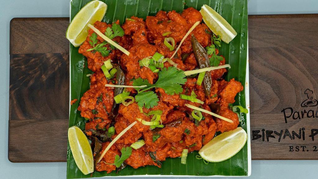 Chicken 65 · Good old dish with chilly, ginger, garlic and other spices. Fried until crispy.