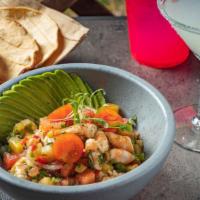 Ceviche Costeño Con Pico De Piña Y Mango · Lime-marinated fresh snapper, gulf shrimp or combo with pineapple and mango pico, tomatoes a...