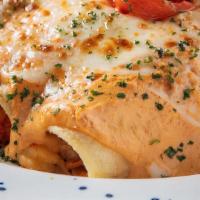 Enchiladas De Acociles · Sautéed crawfish enchiladas, topped with creamy chilpotle sauce and melted Chihuahua cheese ...