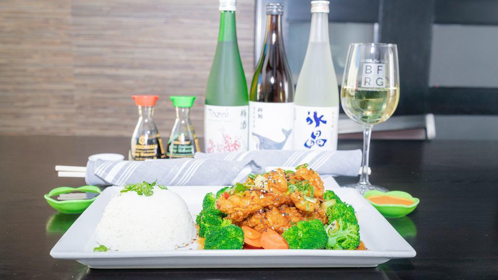 Drunken General'S Chicken · Crispy marinated chicken breast, sweet orange sauce, steamed broccoli, and carrots. With choice white or brown rice.