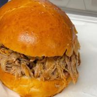 Pulled Pork · Pulled pork sandwich (approx. 6 oz) and choice of one side.