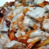 Loaded Fries · Fresh-cut fries topped with homemade white cheddar cheese sauce, pulled pork and burnt ends,...