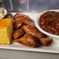 Sausage Platter · Sliced smoked sausage platter (2 sausages), choice of  2 sides and cornbread