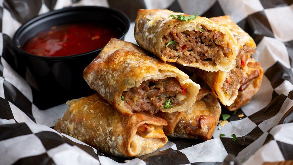 Cheesesteak Egg Rolls · 3 count. Pepper jack served with both sweet chili and beer cheese sauces for dipping.
(This Item cannot be modified)