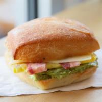 Avocado Breakfast Sandwich · House smashed avocado, handcrafted egg patty, locally baked artisan ciabatta roll with Swiss...