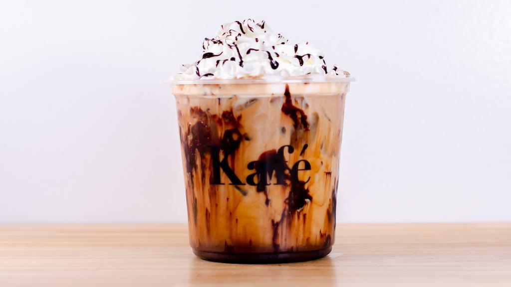 Mocha · Full bodied rich espresso combined with mocha and milk.