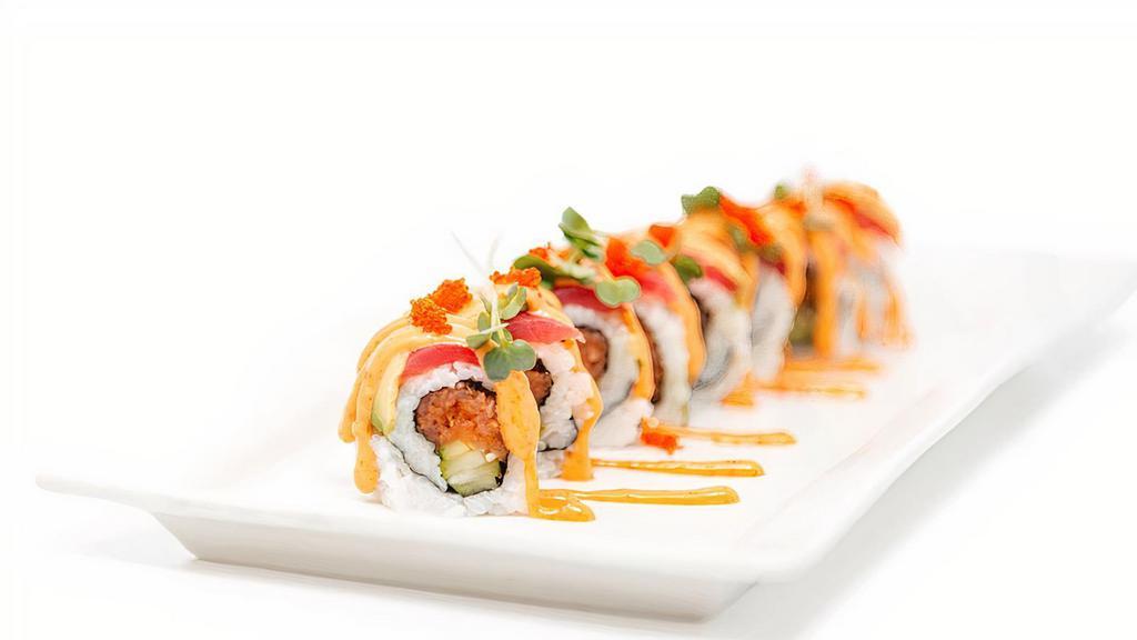 Red Dragon* · spicy ground tuna, cucumber topped with Ahi tuna, avocado with spicy mayo sauce and tobigo.