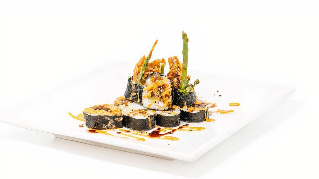 Spider Roll · soft shell crab tempura, avocado, cucumber, asparagus and yamagobo (Japanese carrots) topped with eel and spicy mayo sauce.