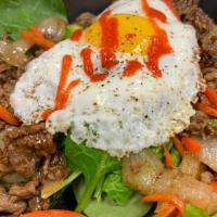 Bulgogi Bibimbap · Your Choice of Protein, Sunny Side Up Egg, Spinach, Carrot, Green Pepper, Onion, White Rice
