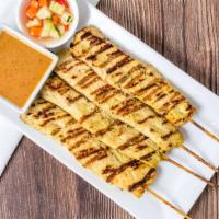 1. Satay · Charcoal-grilled marinated chicken on skewer tipped with peanut sauce.