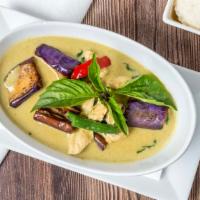 Green Curry · Spicy. Spicy green curry with fresh chili, eggplant and basil in coconut milk.