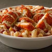 Buffalo Chicken Mac · Crispy chicken tossed in buffalo sauce on top of noodles with housemade cheese sauce.