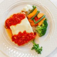 Baked Lasagna · A multilayered pasta stuffed with meat, and cheese, topped with even more cheese and our hom...