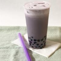 Taro Milk Tea · Made with lactose-free whole milk our taro milk tea is the perfect blend of rich and creamy ...