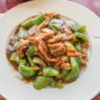 Pepper Steak Combo · Wok stir fried with sliced flank steak, green peppers, carrots and onion in an exotic black ...