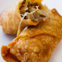 Egg Roll (1Pc) · Ground chicken, cabbage, bean sprouts wrapped in an egg based wrapper and deep fried to a go...