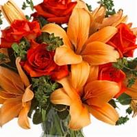 Fiery Lily & Rose · Spark someone's attention by sending this absolutely radiant bouquet. Full of flowers and fi...