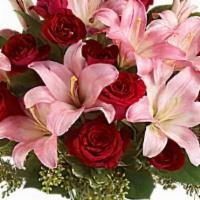 Lavish Love Bouquet With Long Stemmed Red Roses · Lovely reds and pinks come together in this lavishly romantic anniversary gift. Sweetly sent...