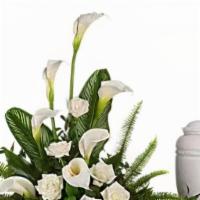 Stately Lilies · A calming portrait in ivory. Majestic calla lilies and stately white roses are framed by the...