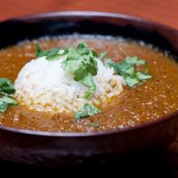 Mulligatawny Soup · Dairy-free. British Raj-style chicken curry soup with rice and garnished with fresh cilantro.