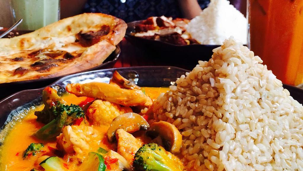 Panang  · A crowd favorite! Smooth red coconut curry, with a blended base of roasted bell peppers, mild red chilis, garlic and shallots.