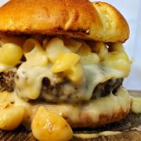 Mac Daddy · Piles of white cheddar mac n cheese atop our famous burger. You'll need a fork for this one!