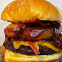 Bbq Burger · BBQ sauce, bacon, two crispy fried onion rings and cheddar