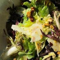 Cat Green Salad · Farmers Market Mixed Greens, Meyer Lemon Vinaigrette, Pistachio, Pecorino Cheese and Black P...