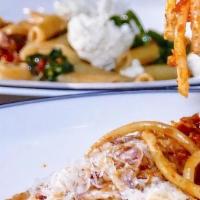 Cat Amatriciana · Pork, Pecorino Cheese, Tomato and Calabrian Chili. -This dish can be made Gluten Free (with ...