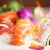 Sushi Sashimi Combo · Assorted of each. 4 pcs. sushi, 12 pcs. sashimi, 1 crunchy tuna.