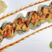 Yami Yami Roll (6 Pcs) · Deep fried of  tempura shrimp, masago, avocado, crabstick, cream cheese and cucumber roll. E...