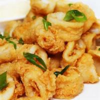 Crispy Calamari · Lightly fried calamari served with our homemade marinara sauce