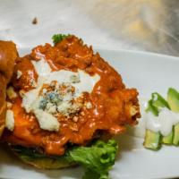 Buffalo Chicken Sandwich · Buttermilk ranch and cayenne battered chicken breast tossed in CP buffalo sauce, LTO, and bl...