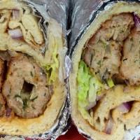 Chicken Seekh Kabab Wrap · Chicken Seekh Kabab wrapped in Naan Bread along with Mayo, lettuce, tomato and onions.