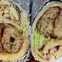 Beef Seekh Kabab Wrap · Beef Seekh Kabab wrapped in Naan Bread along with Mayo, lettuce, tomato and onions.