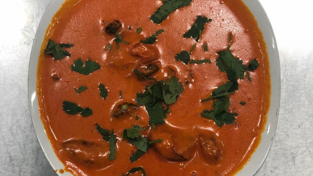 Chicken Tikka Masala · Prepared in a tomato and coriander sauce.Chicken tikka, boneless chunks of chicken marinated in spices and yogurt that are roasted in an oven, served in a creamy curry sauce. Order Sides Separately.