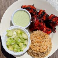 Chicken Tikka Platter · Chicken pieces baked using skewers in Tandoor Oven, marinated in yogurt, onion, spices and s...