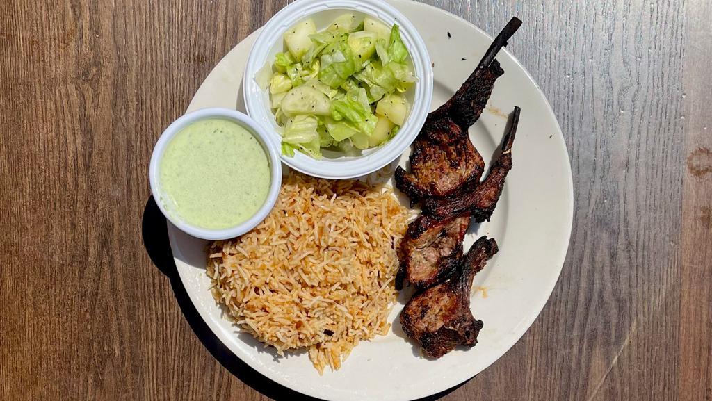 Lamb Chops 3Pcs · Lamb chops baked using skewers in Tandoor Oven, marinated in yogurt, onion, spices and sauce. Served with Side of Mint Sauce, Salad and Choice of Rice or Naan Bread.