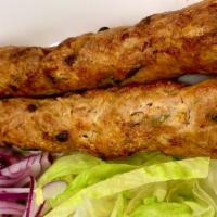 Chicken Seekh Kabab 2Pcs · Made with spiced minced chicken, formed into cylinders on skewers and baked in Tandoor oven....