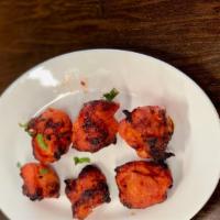 Chicken Tikka Boneless (6) · Chicken chunks of white meat marinated in our special house seasoning.