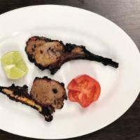 Lamb Chops 3Pcs · Lamb chops baked using skewers in Tandoor Oven, marinated in yogurt, onion, spices and sauce...