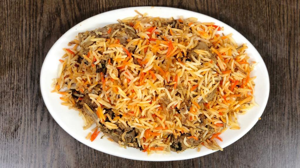 Chicken Biryani · Biryani is one of the most amazing Royal Delicacies, Made by Layering g marinated chicken, parboiled premium Pakistani basmati rice and spices.