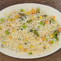 Veggie Fried Rice · Premium Basmati Rice, fried with seasonal, eggs, cilantro and cumin seeds.